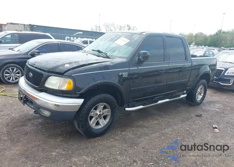 2002 Ford F-150 Lariat/Xlt z USA, uszkodzony, nr VIN 1FTRW08L72KD27457